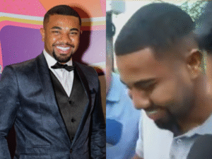 Acusado de ameaçar a ex, Davi Brito sai da delegacia sorrindo e comendo pipoca