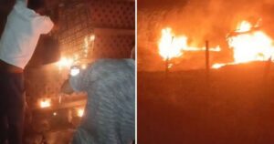 Carreta com carga de eucalipto tomba e pega fogo em Itaquara