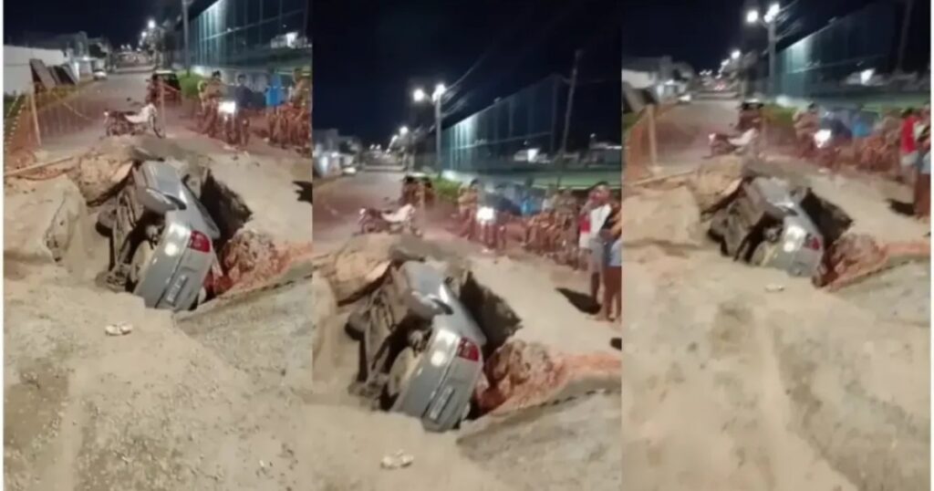 Carro cai em buraco de obra em bairro de Feira de Santana